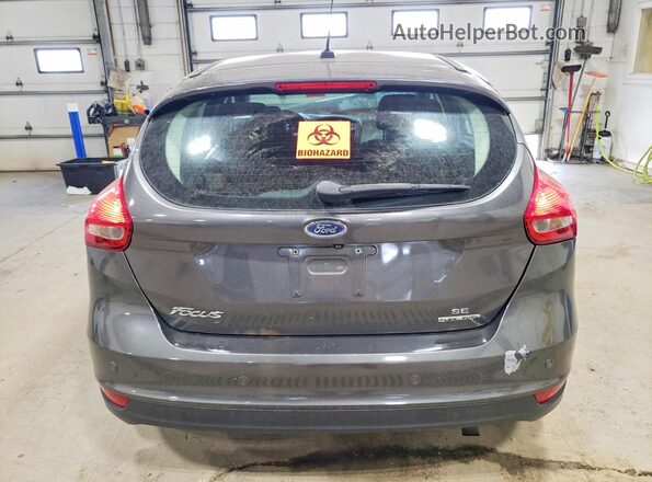 1FADP3K25GL285077 2016 FORD FOCUS Gray Vista trasera