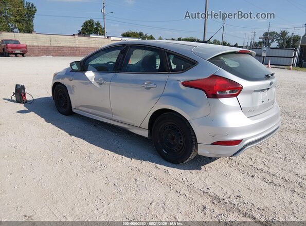 1FADP3K25GL387107 2016 FORD FOCUS Silver Trasero izquierdo