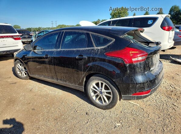 1FADP3K27HL243723 2017 FORD FOCUS Black Trasero izquierdo