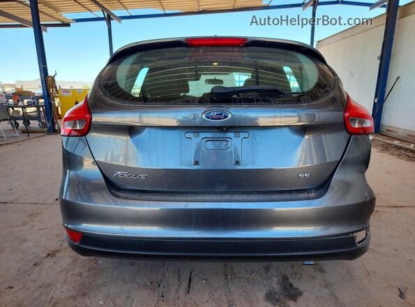 1FADP3K2XJL313141 2018 FORD FOCUS Gray Rear view