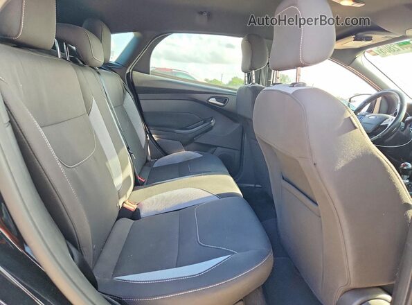 1FADP3L90GL230807 2016 FORD FOCUS Black Vista de los asientos traseros