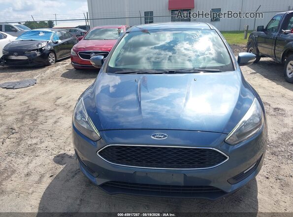 1FADP3M20JL202272 2018 FORD FOCUS Синий Вид задней части салона