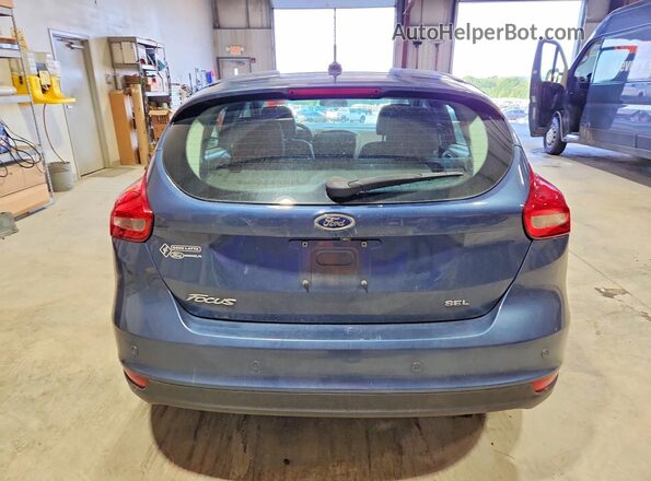 1FADP3M21JL221154 2018 FORD FOCUS Blue Rear view