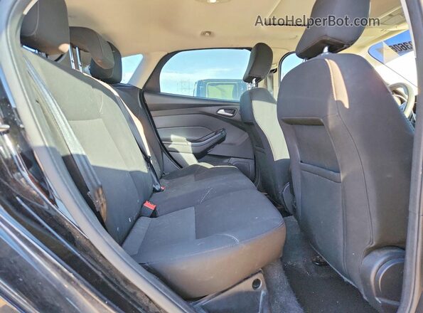 1FADP3M23HL219657 2017 FORD FOCUS Black Rear seats view