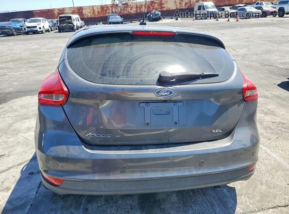 1FADP3M24JL241060 2018 FORD FOCUS Gray Rear view