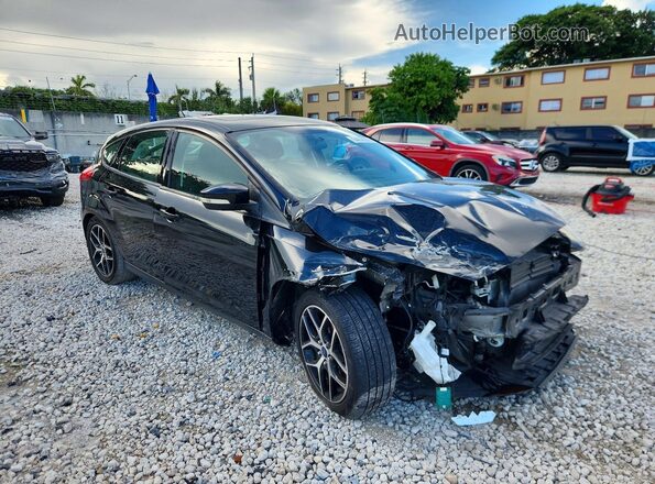 1FADP3M28JL265863 2018 FORD FOCUS Black Front right