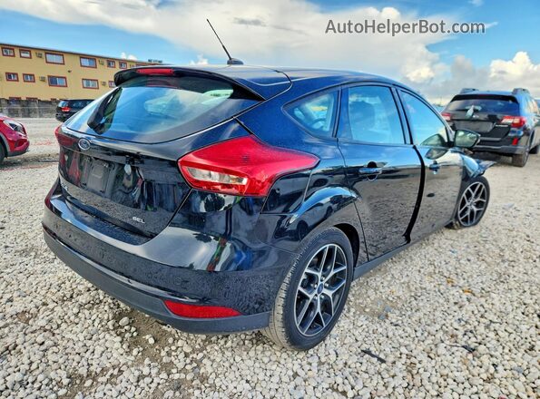 1FADP3M28JL265863 2018 FORD FOCUS Black Rear right