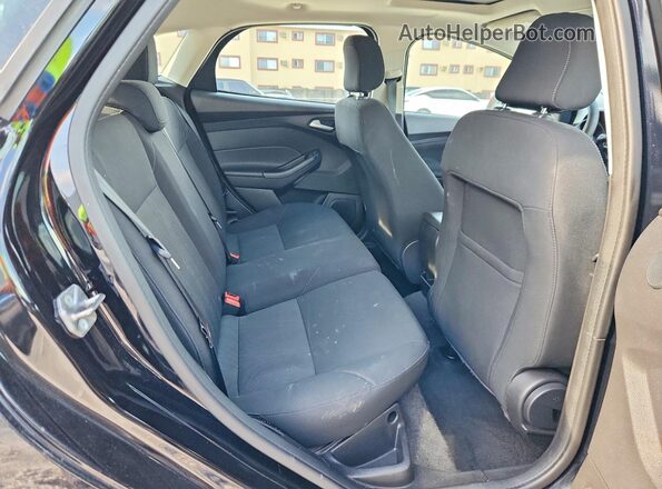 1FADP3M28JL265863 2018 FORD FOCUS Black Rear seats view