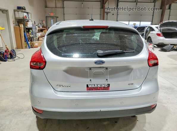 1FADP3M29HL302090 2017 FORD FOCUS Silver Rear view