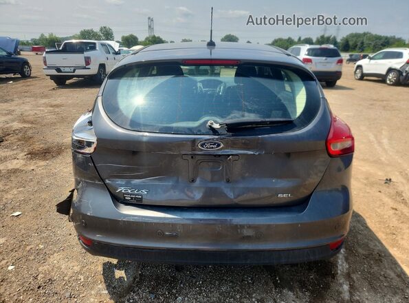 1FADP3M29JL213397 2018 FORD FOCUS Gray Rear view