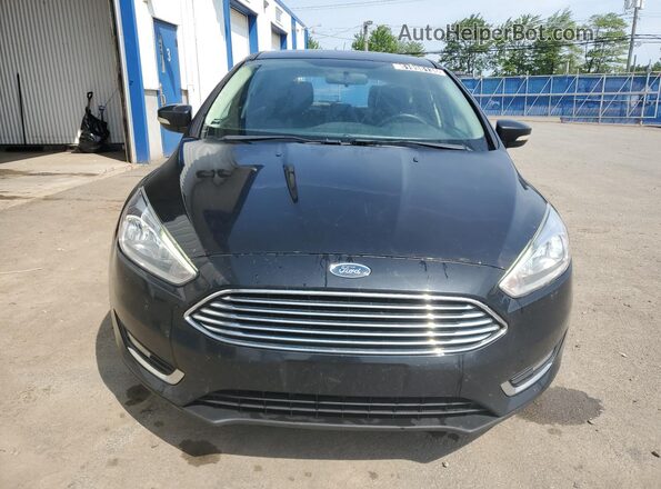 1FADP3N22JL273729 2018 FORD FOCUS Black VIN կոդի պիտակի տեսք