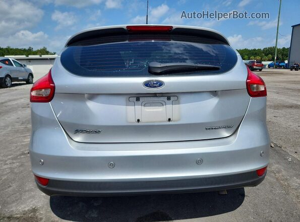 1FADP3N22JL285007 2018 FORD FOCUS Silver Rear view