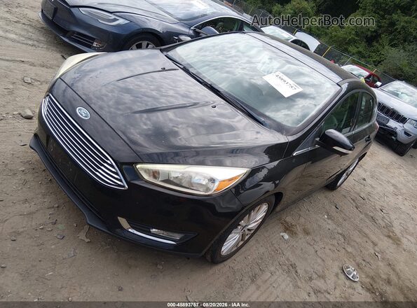 1FADP3N22JL325893 2018 FORD FOCUS Black Przód lewy