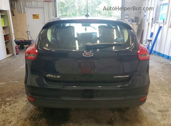 1FADP3N23JL210400 2018 FORD FOCUS Black უკანა ხედი