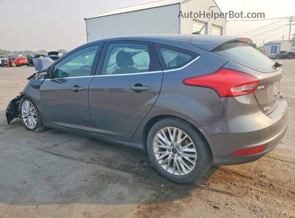 1FADP3N25HL264856 2017 FORD FOCUS Charcoal Rear left
