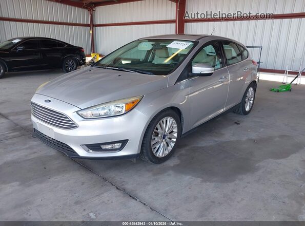 1FADP3N26JL314105 2018 FORD FOCUS Silver წინა მარცხენა ხედი სამი მეოთხედიდან