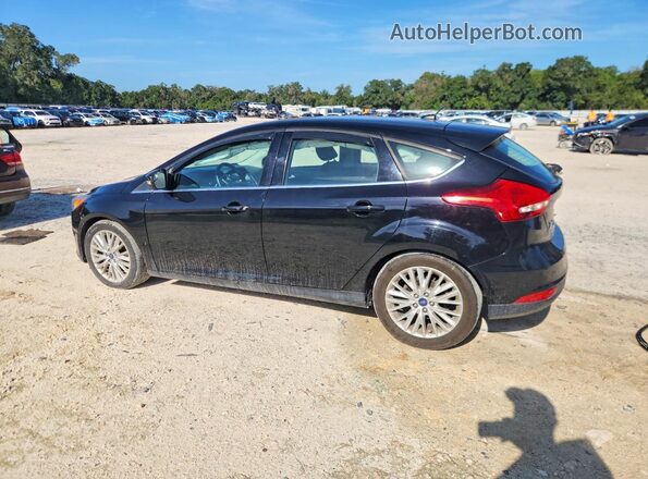 1FADP3N27JL320611 2018 FORD FOCUS Black Trasero izquierdo