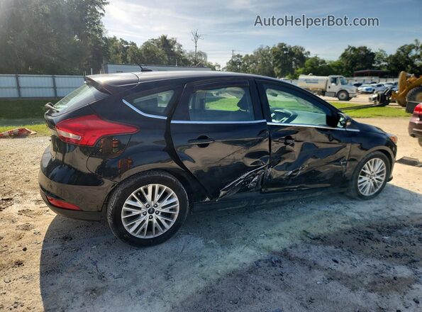 1FADP3N27JL320611 2018 FORD FOCUS Black Trasero derecho