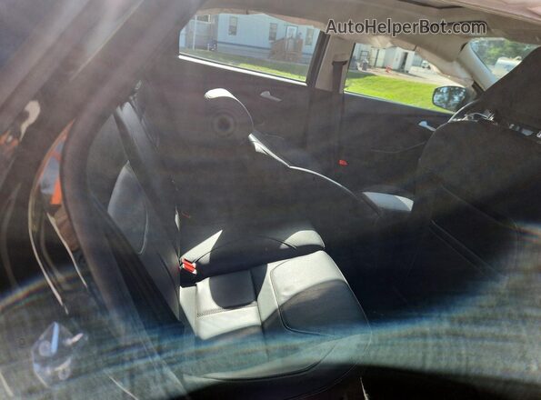 1FADP3N27JL320611 2018 FORD FOCUS Black Vista de los asientos traseros