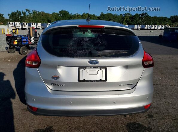 1FADP3N29HL287198 2017 FORD FOCUS Silver Vista trasera