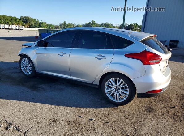 1FADP3N29HL287198 2017 FORD FOCUS Silver Trasero izquierdo