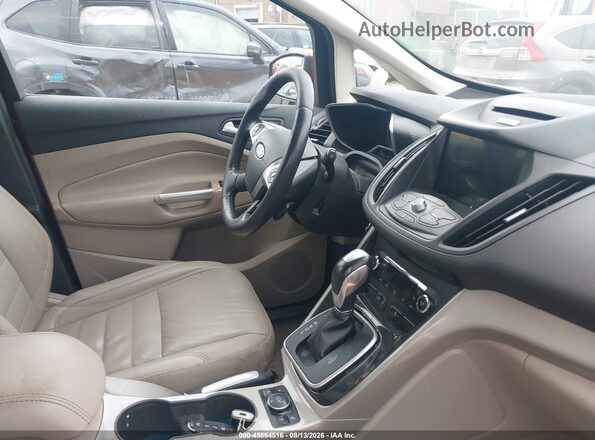 1FADP5CU7GL118943 2016 FORD C-MAX ENERGI Red Vista interior delantera