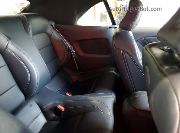 1FAGP8UH2R5119389 2024 FORD MUSTANG Red Vista de los asientos traseros