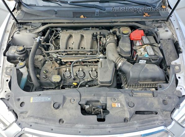 1FAHP2D84HG123013 2017 FORD TAURUS Silver Вид задньої частини салону