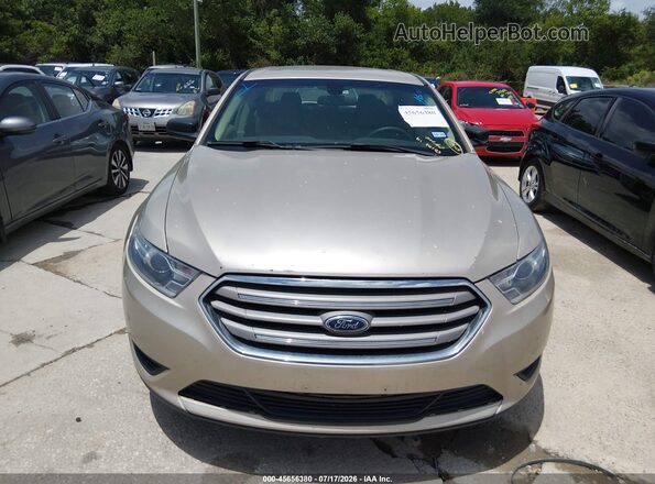 1FAHP2D85HG137471 2017 FORD TAURUS Beige Rear interior view