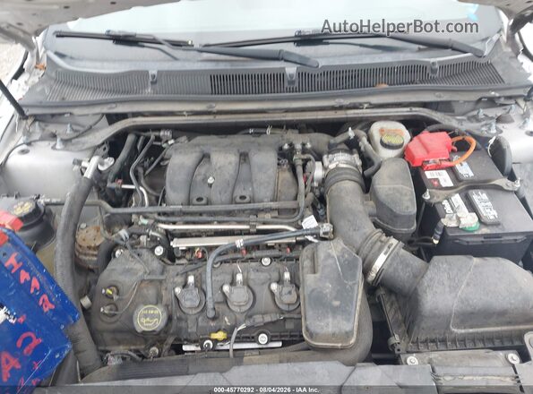 1FAHP2D8XJG118159 2018 FORD TAURUS Silver Rear view