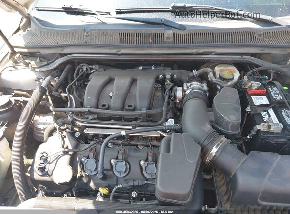 1FAHP2E80GG129338 2016 FORD TAURUS Silver Вид ззаду