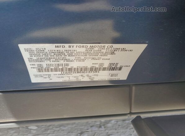 1FAHP2E80JG127595 2018 FORD TAURUS Blue Vista del compartimento del motor