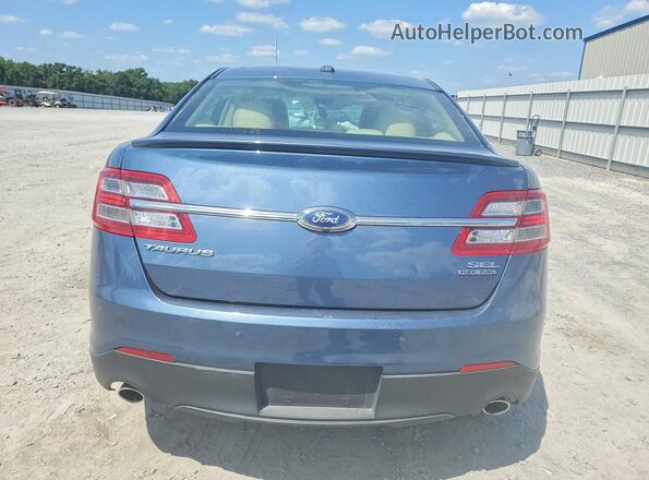 1FAHP2E80JG127595 2018 FORD TAURUS Blue Vista trasera