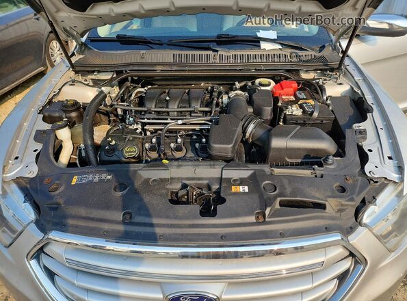 1FAHP2F82JG130433 2018 FORD TAURUS Серебряный Вид задней части салона