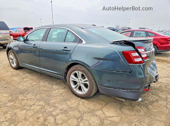 1FAHP2H80GG131537 2016 FORD TAURUS Green Rear left