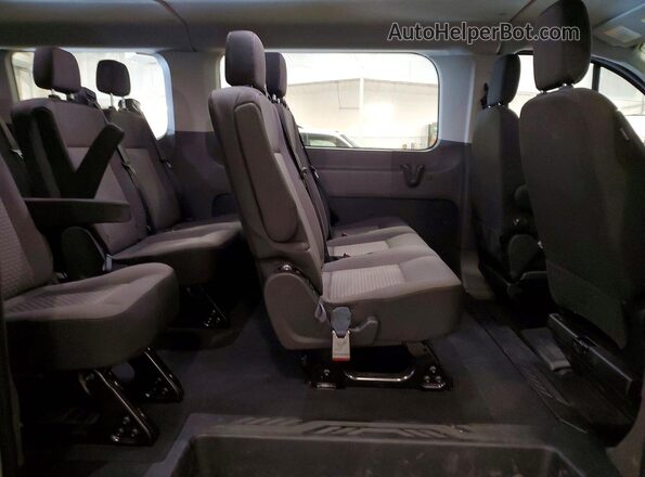 1FBAX9Y84TKB08276 2026 FORD TRANSIT White Vista interior trasera