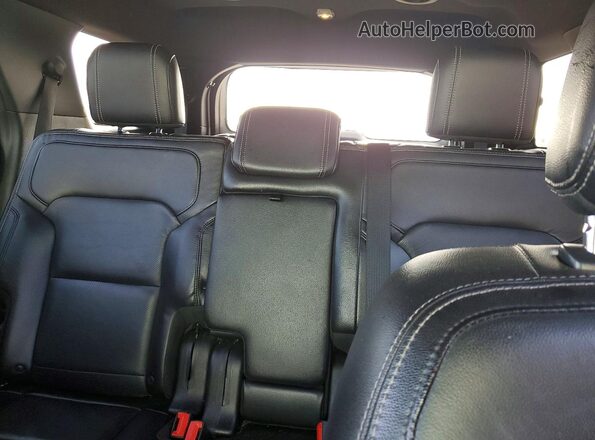 1FM5K7FH8GGC59242 2016 FORD EXPLORER White Rear seats view