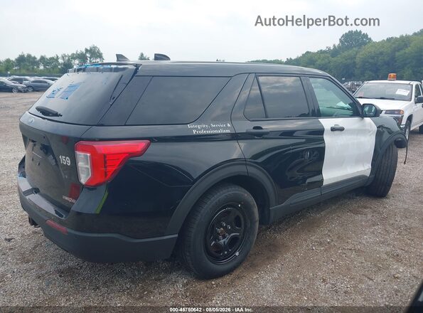 1FM5K8AW7MNA18498 2021 FORD EXPLORER Black Widok wnętrza z tyłu
