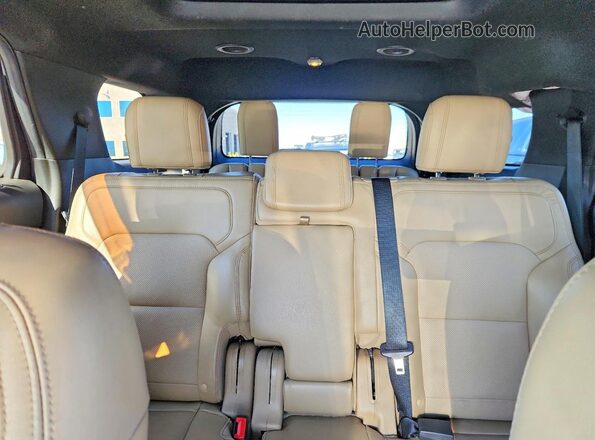 1FM5K8F87GGC86664 2016 FORD EXPLORER White Vista de los asientos traseros