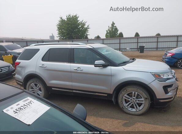 1FM5K8FH4KGA52619 2019 FORD EXPLORER Silver Vista interior trasera