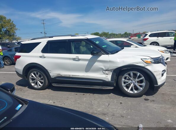 1FM5K8HC6MGA22493 2021 FORD EXPLORER White Vista interior trasera
