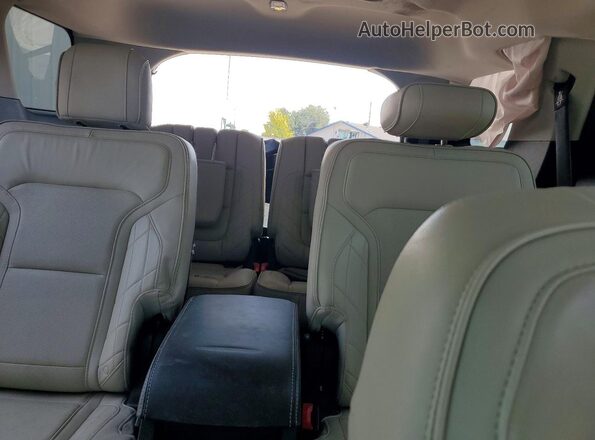 1FM5K8HT8GGB78393 2016 FORD EXPLORER Black Vista de los asientos traseros