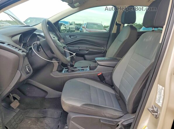 1FMCU0F70HUD34258 2017 FORD ESCAPE Золотой Вид салона спереди