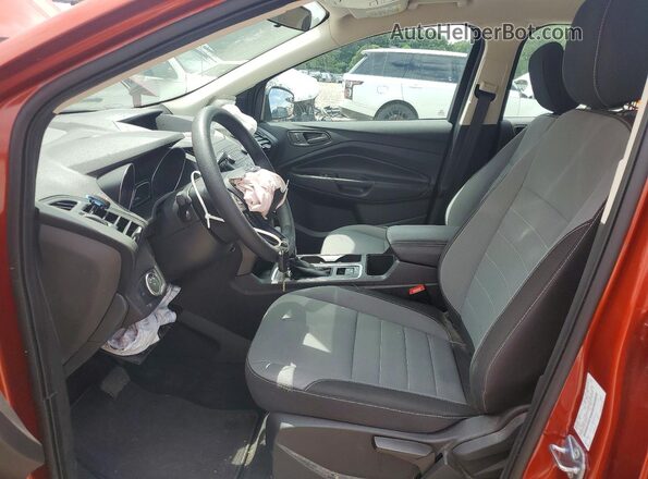 1FMCU0F74KUB46981 2019 FORD ESCAPE Оранжевый Вид салона спереди