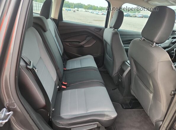 1FMCU0F78JUA36210 2018 FORD ESCAPE Черный Вид задней части салона