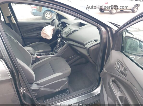 1FMCU0F7XGUC38667 2016 FORD ESCAPE Gray Widok wnętrza z przodu