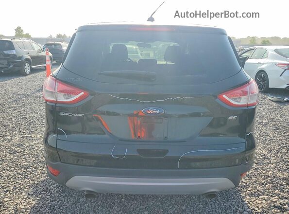 1FMCU0G72GUB46290 2016 FORD ESCAPE Black Вид ззаду