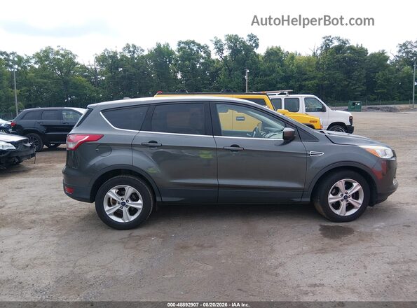 1FMCU0G78GUB79908 2016 FORD ESCAPE Gray Widok wnętrza z tyłu