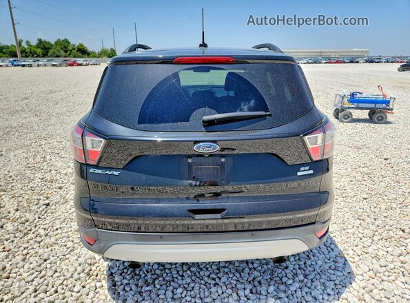 1FMCU0G94HUC60083 2017 FORD ESCAPE Черный Вид сзади