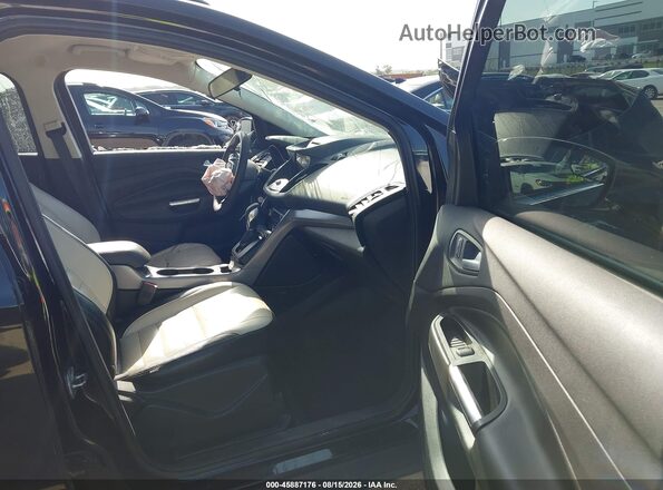 1FMCU0G98GUB58543 2016 FORD ESCAPE Black Front interior view